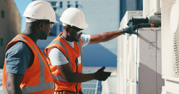 HVAC technicians working